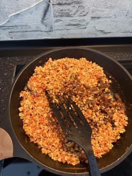 Lentils added to the pan