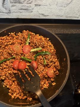 Chilies and tomatoes added