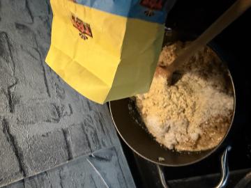 Pouring in the gram flour