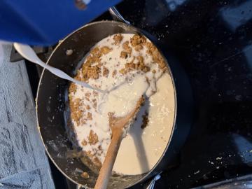 Pouring milk into the mix